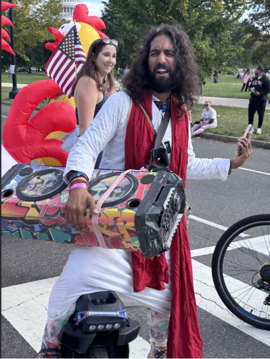 A man at the protest dressed as biblical Jesus promoting empathy for ALL
